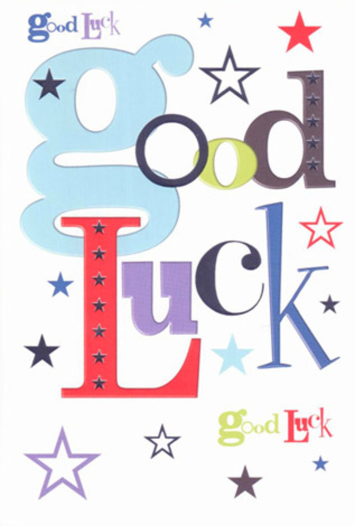 The luck-themed card in this image feels like a little celebration captured on paper, echoing the friendly, artistic buzz you sense wandering through Hackney Wick's canalside walkways. At its heart, the phrase Good Luck spills across a spotless white background, each letter stepping forward with its own personality. One character is wide and pastel blue, almost cloud-soft in its tone; another is slim and inky black, offering contrast and composure; others shout joyfully in exuberant red, mossy green, and deep violet. Together they form a medley of typographic voices that sound like a chorus of friends cheering from the sidelines. Dotted between and around these letters are little bursts of coloured stars-some bold navy, others powder-blue, lilac, lavender, and hints of lemony lime-darting across the card at different angles, like sparks from a festive firework display reflected in the River Lea at night. Their varied sizes, from larger, striking shapes to tiny specks fading toward the edges, give the composition depth and motion, as though the message is radiating outward. The cardstock looks crisp and thick, with a silky, matte surface that would feel smooth beneath your fingertips, producing that soft, papery whisper as you open it. Clean, natural light washes over the design, sharpening the coloured letters while allowing generous white space to breathe around them, creating a modern, uncluttered look that still feels heartfelt. The overall mood is warm, optimistic, and gently excited, ideal for those tender moments before a big interview, a house move from Hackney Wick to a new neighbourhood, or an exam day. You can almost imagine this card propped beside a bright arrangement from Flowers Hackney Wick, quietly adding its own steady stream of encouragement.