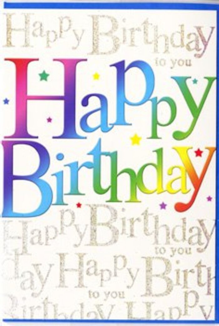 A stylishly festive birthday card stands upright in this image, its design blending bold colour with subtle shimmer in a way that suits Hackney Wick's creative character. The main focus is the phrase Happy Birthday, set in generous, softly curved letters that run confidently across the front. Each letter is dressed in a different segment of a smooth rainbow spectrum: juicy reds melting into rosy pinks, then glowing amber, warm yellow, zesty green, cool teal, and finally deep, midnight blue. The transitions between colours are gentle and seamless, like the gradation in a well-designed floral arrangement where one shade flows effortlessly into the next. The ink appears rich and even, with a soft sheen that suggests a premium print finish. Behind this vivid lettering, the card's background is a warm light cream, almost parchment-like, fully overlaid with repeating lines of Happy Birthday to you in fine golden script. The handwriting style is graceful and flowing, leaning slightly as if written quickly but beautifully by someone who knows the celebrant well. The gold has a subtle metallic quality, reflecting light in tiny flashes reminiscent of sunlight dancing on the surface of the Lea Navigation near Hackney Wick. Small gold accents-perhaps minute stars or dots-intermingle with the script, hinting at confetti swirling in the air but maintaining a clean, uncluttered look. The card stock looks smooth and slightly lustrous, with enough stiffness to stand proudly on a windowsill or side table. Altogether, the design feels both youthful and thoughtful, a perfect partner to a locally crafted bouquet, adding a burst of colour and warmth to any Hackney Wick birthday celebration.